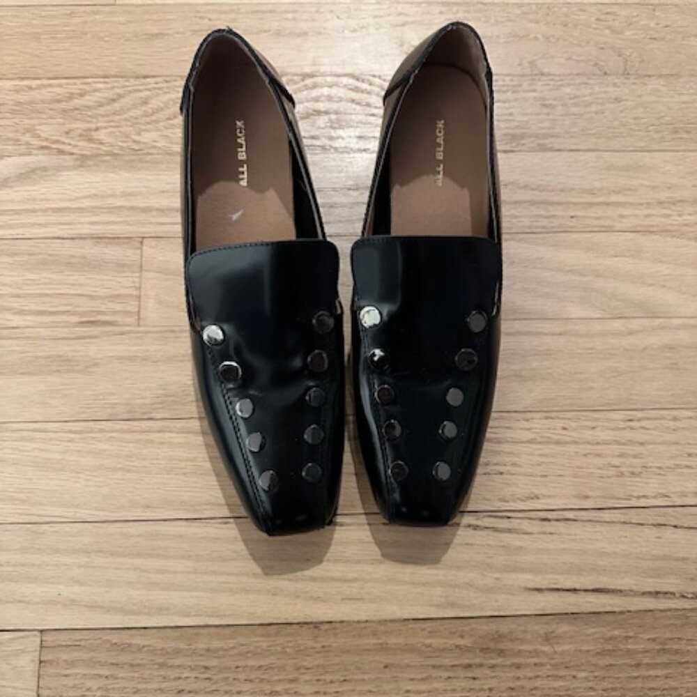Unique black pump-style shoe by All Black